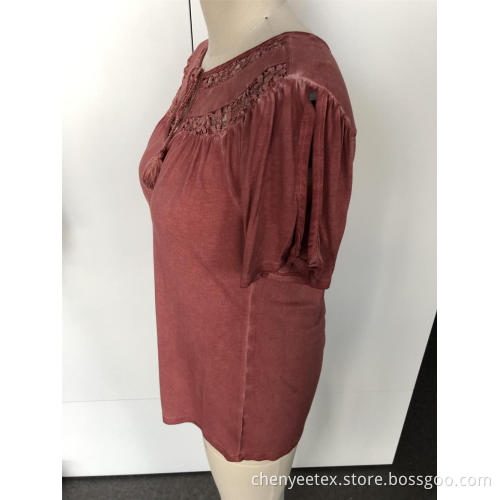 A short-sleeved blouse with tassel cut out